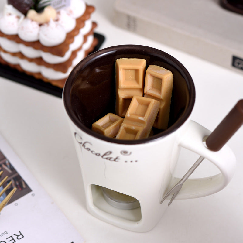 Chocolate pieces melting in a white Fonduette mug